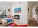 Cozy living room with modern fireplace, colorful decor and comfortable seating, creating a vibrant and inviting space at 737 Barnett Ne St # C4, Atlanta, GA 30306