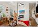 Bright living room with decorative fireplace, warm lighting, hardwood floors, and inviting furnishings for comfortable living at 737 Barnett Ne St # C4, Atlanta, GA 30306