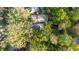 Aerial view of a home nestled among mature trees offering privacy at 1450 N Morningside Ne Dr, Atlanta, GA 30306
