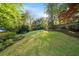 Sprawling backyard with lush greenery and manicured landscaping at 1450 N Morningside Ne Dr, Atlanta, GA 30306