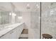 Elegant bathroom with a marble countertop, walk-in shower, and herring bone floors for a luxurious feel at 1450 N Morningside Ne Dr, Atlanta, GA 30306
