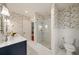 Bright bathroom with a glass-enclosed shower, a marble countertop, and attractive bird-themed wallpaper at 1450 N Morningside Ne Dr, Atlanta, GA 30306