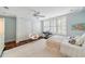 Serene bedroom features large windows, light blue walls and hardwood floors at 1450 N Morningside Ne Dr, Atlanta, GA 30306