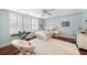 Bright bedroom with large windows, shutter blinds, hardwood floors and modern decor at 1450 N Morningside Ne Dr, Atlanta, GA 30306