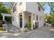 Charming home exterior featuring white siding, stone walkway, and well-maintained landscaping at 1450 N Morningside Ne Dr, Atlanta, GA 30306