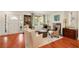 Cozy living room features hardwood floors, fireplace, and large windows at 1450 N Morningside Ne Dr, Atlanta, GA 30306