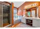 Bathroom featuring a walk-in shower, soaking tub, double sinks, and ample counter space at 1920 Barrington Dr, Jonesboro, GA 30236
