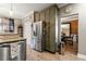 Kitchen with stainless steel appliances, granite countertops and wood-look flooring at 1920 Barrington Dr, Jonesboro, GA 30236