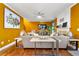 Bright living room with hardwood floors, stylish decor, and a fireplace at 1920 Barrington Dr, Jonesboro, GA 30236