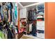 Organized walk-in closet features shelving, hanging racks, cabinets, and ample storage space at 1920 Barrington Dr, Jonesboro, GA 30236