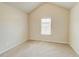 Neutral bedroom with carpet, natural light, and vaulted ceiling at 806 Relic Rdg, Hampton, GA 30228