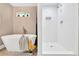 Bright bathroom featuring a freestanding tub and shower, enhancing the spa-like atmosphere at 1094 Regent Sw St, Atlanta, GA 30310