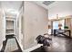 Hallway leading to living area with hardwood floors, neutral walls, and ample storage at 1094 Regent Sw St, Atlanta, GA 30310