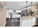 Modern kitchen featuring stainless steel appliances, granite countertops, and white cabinets with a breakfast bar at 1094 Regent Sw St, Atlanta, GA 30310