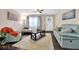 Bright and airy living room with stylish furnishings, neutral tones, and plenty of natural light at 1094 Regent Sw St, Atlanta, GA 30310