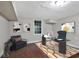 Home office featuring hardwood flooring, a large window, and modern decor at 1094 Regent Sw St, Atlanta, GA 30310