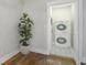 Efficient laundry room with stacked washer and dryer units and patterned floor tiles at 1934 Pinedale Pl, Decatur, GA 30032