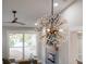 Living room highlighting a decorative chandelier, ceiling fan, and modern fireplace at 1934 Pinedale Pl, Decatur, GA 30032