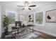 Bright office with large windows, stylish desk, and modern decor for a productive workspace at 1934 Pinedale Pl, Decatur, GA 30032