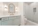Bathroom featuring glass shower, toilet, and vanity with marble countertop and modern fixtures at 260 Guild Ln, Fayetteville, GA 30214