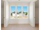 Bright, modern room with beautiful wood floors and a view from its large windows at 260 Guild Ln, Fayetteville, GA 30214