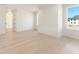 Bright interior view with white walls, wooden floor, and big windows for lots of natural light at 260 Guild Ln, Fayetteville, GA 30214