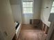 Bathroom with a bathtub and a window providing natural light at 4481 Dunmovin Nw Dr, Kennesaw, GA 30144