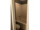 Bathroom featuring a white bathtub, shower, and toilet at 6434 Wellington Chase Ct # 6434, Lithonia, GA 30058