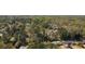 Aerial view of a neighborhood featuring mature trees and community pool at 53 Weatherstone Pkwy, Marietta, GA 30068