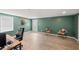 Finished basement features updated flooring, ample lighting, and an exterior door at 53 Weatherstone Pkwy, Marietta, GA 30068