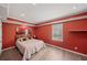Cozy bedroom featuring hardwood floors, warm colors, recessed lights, and serene ambiance at 53 Weatherstone Pkwy, Marietta, GA 30068
