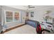 Comfortable bedroom with hardwood floors, ample natural light, and charming decor, creating a cozy retreat at 53 Weatherstone Pkwy, Marietta, GA 30068