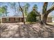 Charming single-Gathering home with a well-maintained lawn and inviting front porch at 53 Weatherstone Pkwy, Marietta, GA 30068