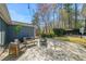 A cozy, tiled patio area with comfortable outdoor furniture, perfect for relaxing and entertaining at 53 Weatherstone Pkwy, Marietta, GA 30068