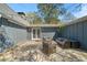 An inviting outdoor patio with ample seating, string lights, and access to the house at 53 Weatherstone Pkwy, Marietta, GA 30068