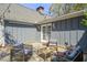 Charming patio with a cozy seating arrangement, French doors, and soft lighting at 53 Weatherstone Pkwy, Marietta, GA 30068