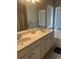 Bathroom features a double sink vanity and large mirror at 5915 Windsorcreek Dr, Douglasville, GA 30135