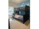 bedroom features a bunk bed with a ladder at 5915 Windsorcreek Dr, Douglasville, GA 30135