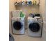 The laundry room features a washer and dryer at 5915 Windsorcreek Dr, Douglasville, GA 30135