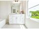 Bathroom featuring a large window with beautiful exterior views at 2029 Memorial Dr # 32, Atlanta, GA 30317
