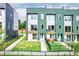 The exterior of the property features a well-maintained lawn, fence, and a patio with seating at 2029 Memorial Dr # 32, Atlanta, GA 30317