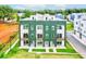 Aerial view of modern, green townhomes with balconies, showcasing contemporary design and community layout at 2029 Memorial Dr # 32, Atlanta, GA 30317