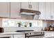 Close-up on a kitchen with stainless steel appliances and a window overlooking the outdoors at 2029 Memorial Dr # 32, Atlanta, GA 30317