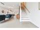 Bright living room and staircase featuring an open floor plan and modern design at 2029 Memorial Dr # 32, Atlanta, GA 30317