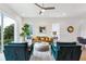 Open-concept living room with elegant furniture, hardwood floors, neutral colors, and a ceiling fan at 2029 Memorial Dr # 32, Atlanta, GA 30317