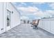 A spacious outdoor patio features stylish seating and a tiled floor for a comfortable lounging experience at 2029 Memorial Dr # 32, Atlanta, GA 30317