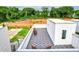 An aerial view shows the tiled patio with comfortable chairs and an open view of the surrounding area at 2029 Memorial Dr # 32, Atlanta, GA 30317