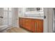 Stylish bathroom featuring a double vanity with wood cabinets and modern fixtures at 2769 Peachtree Ne Rd # 10, Atlanta, GA 30305
