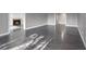 Open-concept living room with hardwood floors and fireplace at 2769 Peachtree Ne Rd # 10, Atlanta, GA 30305