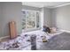 Unfinished room featuring dark wood floors, large window, and awaiting the new homeowner's final touches at 2769 Peachtree Ne Rd # 10, Atlanta, GA 30305